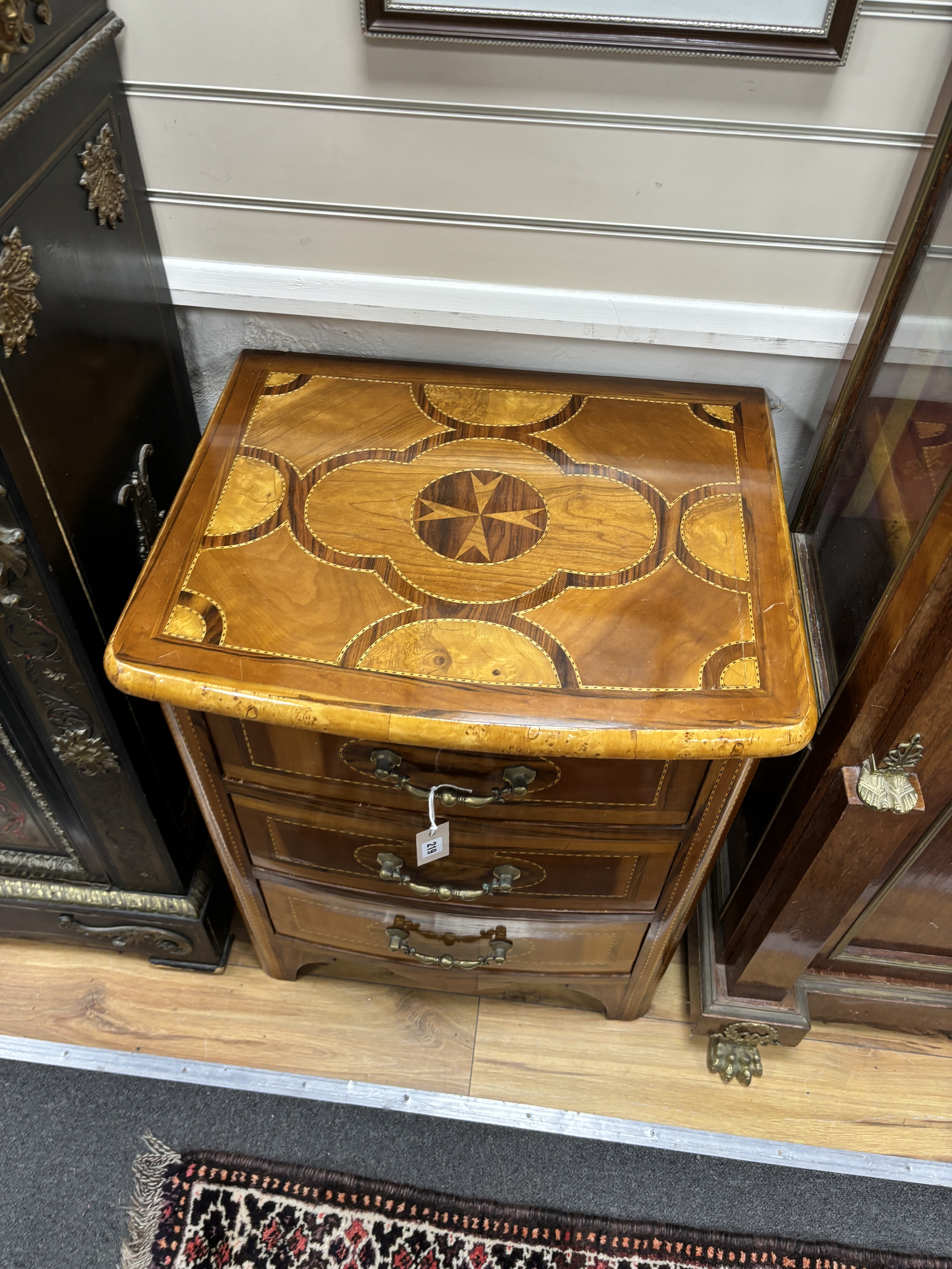 A Dutch style bow front three drawer small chest, width 62cm, depth 50cm, height 76cm